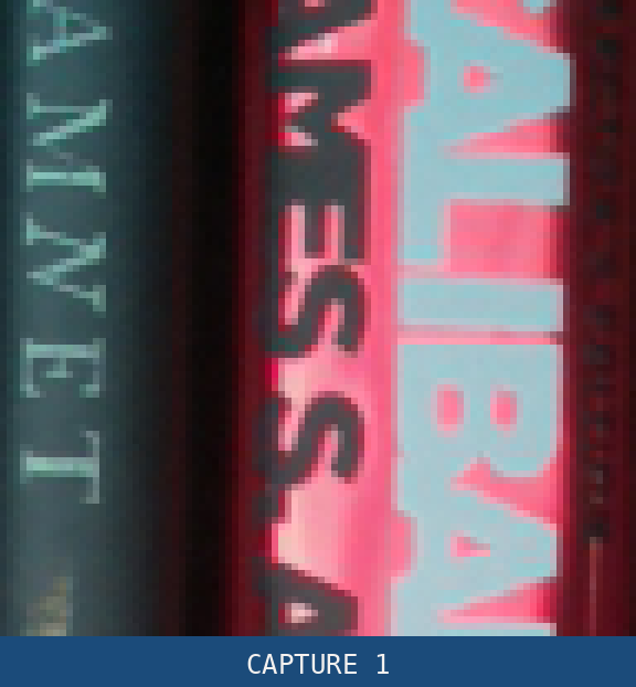 Animation alternating between the same magnified region of the two captures every half second. The lettering holds still while the surface crawls.